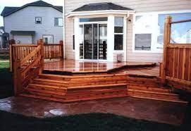 The frame hides the cut ends of the decking but also adds some labor, such as miter cuts and blocking to support the decking. Image Result For Multi Level Decks And Patios Deck Design Plans Deck Designs Backyard Deck Design