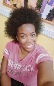 My Hairdresser Sonya Wade just finished washing and blow drying my hair  with my Hair Products I usually bring with me to the Salon. Now she is  going to twist my hair