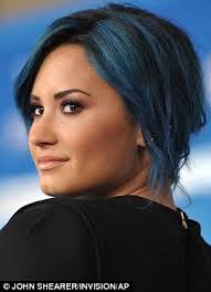 News about the blue 'do. Demi Lovato Wears Revealing Black Dress To The Premiere Of Frozen Demi Lovato Hair Color Demi Lovato Blue Hair Demi Lovato Hair