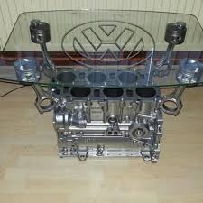 Thos coffee table is made from a toyota 6v engine block and pistons. A Perfect Vr6 Engine Block Being Humiliated As A Coffee Table Woeful Garage Furniture Automotive Decor Car Part Furniture