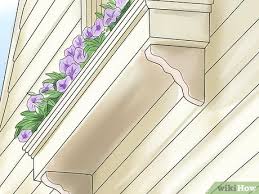 Measure width of side boards for slot and mark board 1/2 from end. How To Build A Window Box With Pictures Wikihow