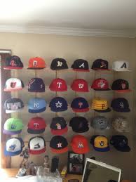 My Hat Collection Is Complete One Hat From Each Team And A Sweet Way To Display It I Think My Dad And I Shoul Diy Hat Rack Hanging Hats Hat Display