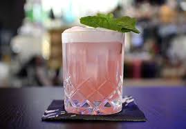 A beautifully presented jar containing 11 wild hibiscus flowers in syrup with 8 page cocktail guide on the lid. All Natural Watermelons Hibiscus Syrup Maya S