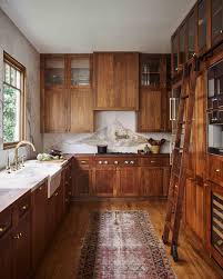 This Dreamy Wooden Interior Kitchen Would Be The Perfect Little Cooking Nook In 2020 Dark Wood Kitchens Home Decor Kitchen Interior Design Kitchen