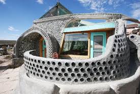 Earthship Homes Eco Friendly Use Of Tires And Dirt Earthship Home Earthship Sustainable Home