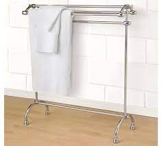 An excellent way to keep the interior style cohesive is to match the towel rack finish to the faucet or drawer hardware. Mercer Towel Stand Pottery Barn