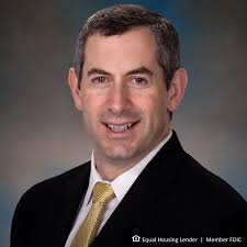 We're proud to have recently promoted Russell Brewer, Ronald Bacon, James  Vedora, and Micki Stewart to new roles within the company. Russell was  named senior vice president, commercial banking group manager to