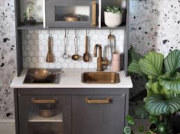 I love that this play kitchen is simple, modern, has a light up stove, and built in storage. Diy Kid S Play Kitchen Upcycling Hack Lust Living