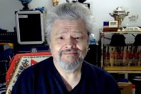 Johnny Winter sits in