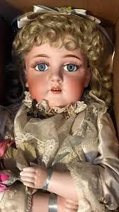 Can anyone identify the tall woman in the photo?