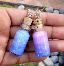 Blue An Purple Nebula Necklaces By Saloscraftshop On Deviantart Bottle Charms Nebula Necklace Bottle Necklace