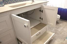 The marble backsplash gets a special touch with a custom curve. Clever Bath Vanity Design Helps Give Special Needs Child More Independence