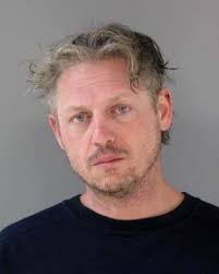 Charges: Western Minnesota man stabbed roommate in both eyes, shot him 16  times