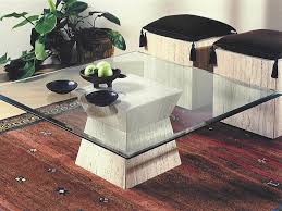 As the most visible portion when standing, some believe the table's top commands more attention. Stone International Clepsy Glass Top Square Coffee Table With Marble Base