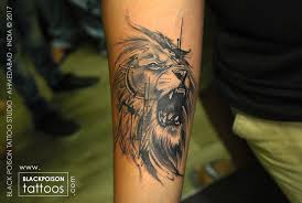 The open mouth feature looks extra real, especially once the tattoo artist adds in pink ink to the tongue. Lion Tattoo Designs Best Tattoo Artist In India Black Poison Tattoo Studio