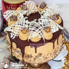 Almond Roca Caramel Cake Video Tatyanas Everyday Food Recipe In 2020 Cake Baking Toffee Cake