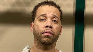 Man caught smuggling two young children, mother inside trunk