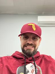 In the office, Ready to get off and go to the Game!!