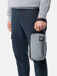 Ash Grey 9200019 COATED NYLON METAL IN ECONYL® Wrist pouch with internal  pockets and zip closure | Stone Island RU