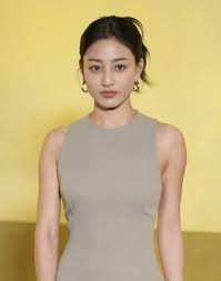 TWICE Leader Jihyo Made a Case for Monochrome at the AMI Paris Show — See  Photos | Teen Vogue