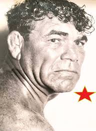 From the 1927 Phillips High School yearbook (Birmingham, Alabama), in the  middle is a young Jimmy "Kid" Lott in his junior year. While still in  school, he trained in wrestling and boxing,