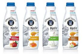 Toss in a couple of blueberries (not all of them because it will freeze the yogurt), coat the blueberries with the yogurt, and remove with toothpicks. Greek Gods Kefir Milk Packaging Yogurt Packaging Kefir