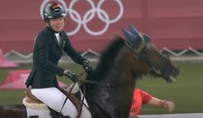 Kim raisner was trying to assist german annika schleu as she battled to control saint boy ahead of her show jumping round in the women's event on friday. 5zsa8ptxsizaum