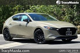 Image result for Shimmering Sand 2007 Mazda3