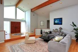 This midcentury modern living space incorporates a dining area and a recreation area on a lower level. Sunken Living Rooms 101 Can The Old Fad Make A Comeback Bob Vila