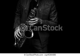 The player puts this onto the saxophone mouthpiece and adjusts it to just the right angle so that you can have a jazz combo with as few as three players, as long as two of them play piano and drums. Jazz Saxophone Player On The Stage Black And White Color Male Jazz Saxophone Player On The Stage With Leather Jacket Black Canstock