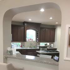 painting dark kitchen cabinets white