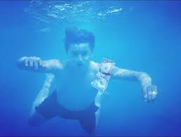 The cover of nirvana's 1991 album nevermind. cobain commissioned the shoot after he had seen a documentary on babies being born underwater and thought the image would make a cool cover, fisher. I Was Bored So I Figured I D Recreate The Nevermind Album Cover Nirvana