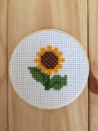 Use the jar lid (not the ring) as a template to cut out several circles of fiberfill. Sunflower Mason Jar Mason Jar Decor Cross Stitch Mason Jar Lid Sunflower Magnet Cross Stitch Sunflower Cross Stitch Flowers Simple Cross Stitch