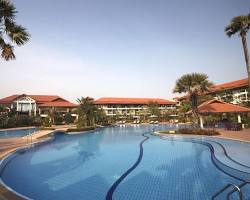 Lush pool area at Angkor Palace Resort & Spa