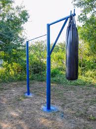 Cut the bag open using a hoe. Homemade Bar With A Punching Bag Outdoors In The Stock Image Image Of Gymnast Blank 144690567