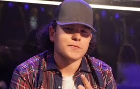 American idol contestant caleb kennedy has exited the current season after a video surfaced that appears to show him standing next to someone in a ku klux klan hood. Bz1 Eeeyaxu Km