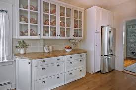 I had painted all the oak doors creamy white prior to this. How To Utilize Glass Front Cabinets In Your Kitchen