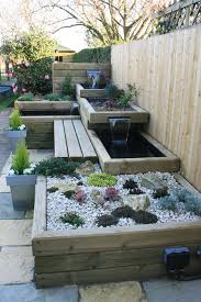 Jacksons Timber Retaining Wall Jakwall Used To Design A Fantastic Garden Water Featur Water Features In The Garden Backyard Water Feature Small Garden Design