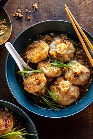 Add parsley or chives for color. Sesame Chicken Dumplings In Spicy Broth With Garlic Crisps Half Baked Harvest