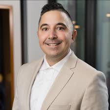 How to reset a frozen infotainment screen in a GMC Sierra EV?