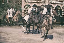 Scene from the film the long riders depicting the northfield bank robbery. Arthur Ramsey Jesse James Days Northfield Mn
