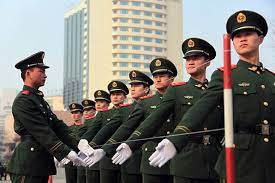 Calls for action against racism of england. Chinese Cops Stick Pins Through Collars To Jab Their Necks For Drill World News Mirror Online