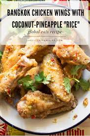 Global Eats Bangkok Chicken Wings With Coconut Pineapple Rice Recipe The City Sidewalks Global Recipes Recipes Pineapple Rice
