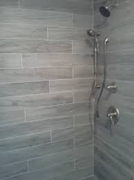 5 Stars For Oceanside Oak Wood Look Tile Is Perfect For Areas Of The Home Where Moisture Might Be A Concern Kitc Wood Tile Shower Shower Tile Wood Look Tile