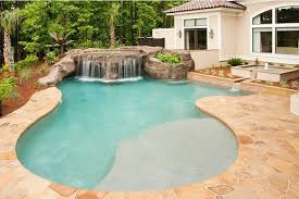 Darker plaster colors, like deeper shades of grey and black, add depth to the pool and enhance the water's reflective quality. The Ultimate Guide To Pool Finishes Luxury Pools Outdoor Living