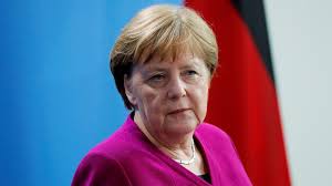 Angela merkel looks like she needs a lift on hols with her hubby. How Angela Merkel Keeps Power In A Man S World The Atlantic