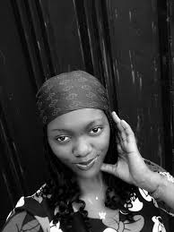 I gave this girl the small orange I had, and she said it was too little.  Then another girl took it, even though it wasn't easy for her. In the end, I