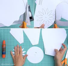 Hold the base of the petal as you are doing this and be gentle as to not tear the petal. How To Make Giant Paper Roses Plus A Free Petal Template