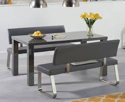 The table is surrounded with a bench and a set of matching stools for seating. 160cm 4 Seater Dark Grey Gloss Table And Bench Set Homegenies