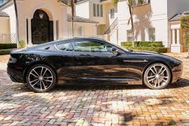 Image result for Jet Black 2011 Aston Martin